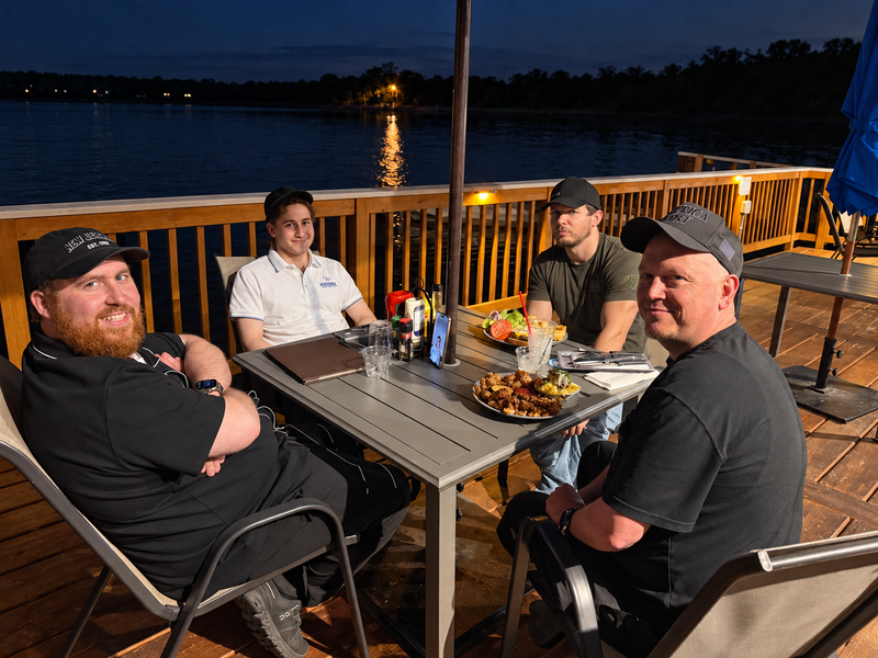 Micha and the Medorra team gathered around a table in Florida
